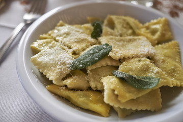 Ravioli pasta with butter and sage