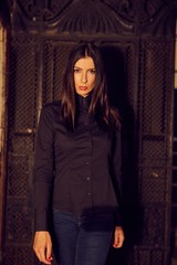 Fashion photo of trendy woman in black shirt