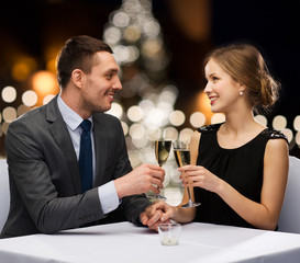 couple with non alcoholic champagne at christmas