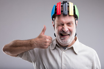 old man with bicicle head protection