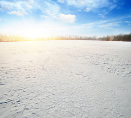  Snowcovered fields on blue sky