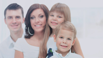 Beautiful happy family - isolated over a white background