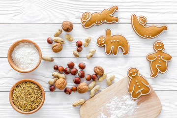 Make gluten free healthy food. Yoga asanas cookies near desk, flour and wheat on white background top view copyspace