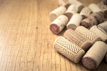 Bunch of wine corks on wooden table