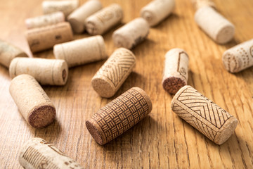Fototapeta na wymiar Bunch of wine corks on wooden table