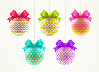Set of multicolored Christmas baubles with color bow. Vector illustration.