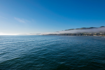 Waiting for the Sun to set at Pismo Beach, Oceano Dunes Natural Preserve, California, USA