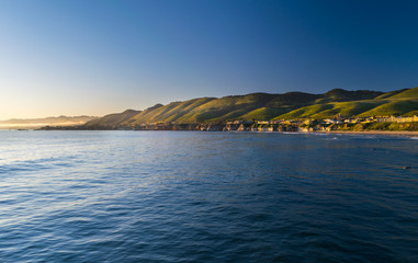 Waiting for the Sun to set at Pismo Beach, Oceano Dunes Natural Preserve, California, USA
