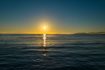 Waiting for the Sun to set at Pismo Beach, Oceano Dunes Natural Preserve, California, USA