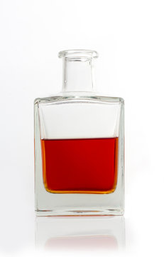 square decanter with whiskey on white background for isolation