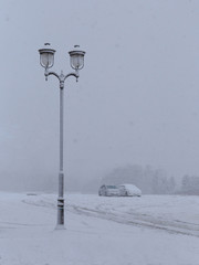 winter town with vintage classic lamp post.