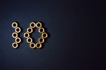 golden mechanic nuts forming number ten