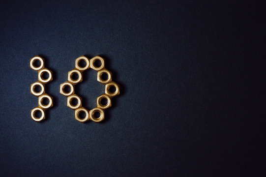 golden mechanic nuts forming number ten