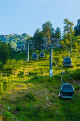 Obraz premium Bottom view of the cableway on the mountainside in Rosa Khutor, Russia