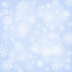 New Year snowflakes and glare blue background