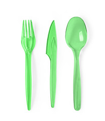 Plastic cutlery on a white