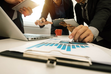 Business team meeting present.professional investor working with new startup project. Finance managers task.Digital tablet laptop computer design smart phone in morning light