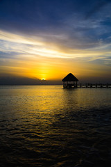 gazebo bridge Caribbean sea at sunset