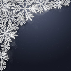 Fototapeta na wymiar Christmas and new year dark blue background with christmas silver glittering snowflakes on dark background. Merry Christmas greeting card