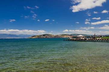 Fototapeta na wymiar Ohrid Lake and the beaches around the lake with the background scene of Ohrid Town 
