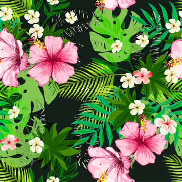 Seamless exotic pattern with tropical leaves and flowers.