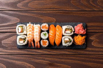 Set of Japanese sushi on wooden background. Close up