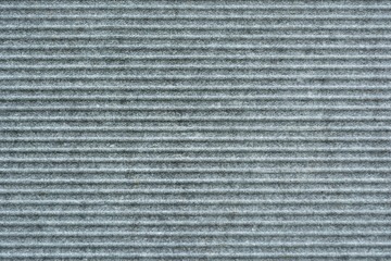 close-up view of grey wavy slate background.slate with horizontal stripes.