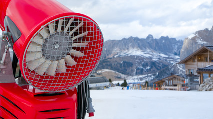 Snow cannon close up in alpine scenery