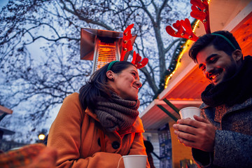 Couple On Christmas Market