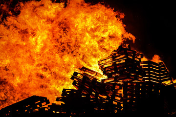 Wooden pallets burning on a bonfire