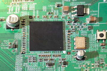 Electronic circuit board close up.