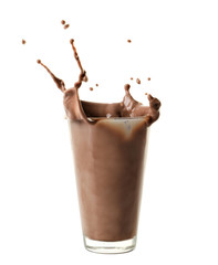 Glass with splashed cocoa on white background