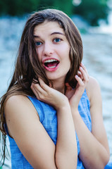 portrait of a beautiful cheerful girl. Portrait of a cheerful girl traveler. I'm enjoying life. Happiness in every day. Girl close. Crazy discounts, the joy of shopping 
