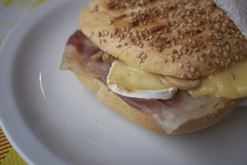 Sandwich with ham and brie
