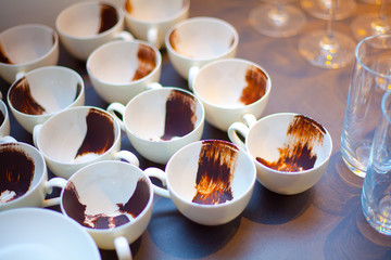 Dessert in a cup. Chocolate in the cup. Preparation of dessert. Coffee cups.