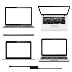 Set of vector laptops with blank screen in different positions