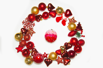 Top view on frame made of christmas decoration with new year balls on isolated white background