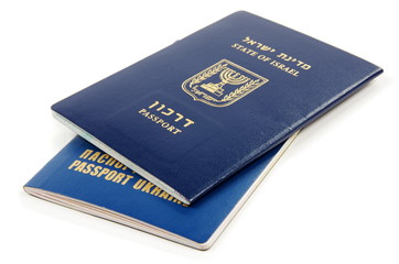 Israel and Ukraine passport on the white