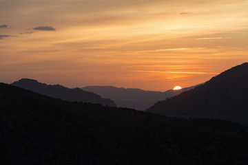 Fototapeta premium dramatic sunrise in the mountains of Corsica