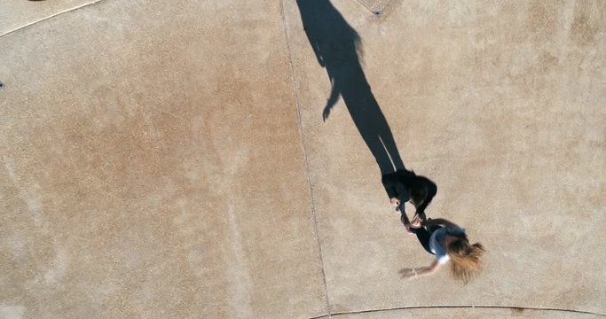 Aerial top down close up view of Caucasian young couple dancing salsa