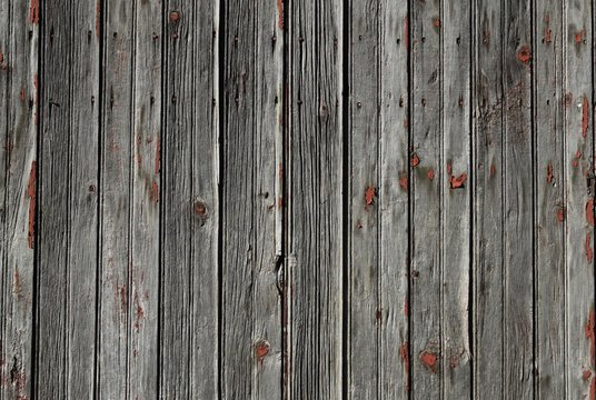 closeup of an old weathered wooden slat wall for backgrounds 