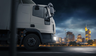 Truck infront of a City