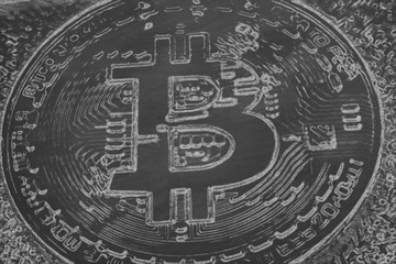 bitcoin drawn on black chalk board