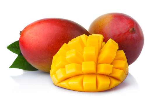 Ripe mango fruits with slices isolated on white background