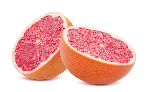 two halves of grapefruit isolated on a white background