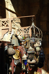Fototapeta na wymiar ancient Arabic antiques, traditional folk items. Souvenirs in the Khan al-Khalili market, Egypt