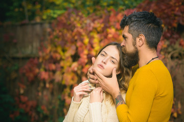 Couple in love in autumn park.