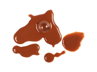 Spilled chocolate milk puddle isolated on white background, top view