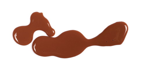Spilled chocolate milk puddle isolated on white background, top view