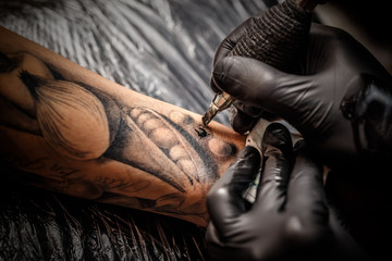 Fototapeta na wymiar Professional tattoo artist